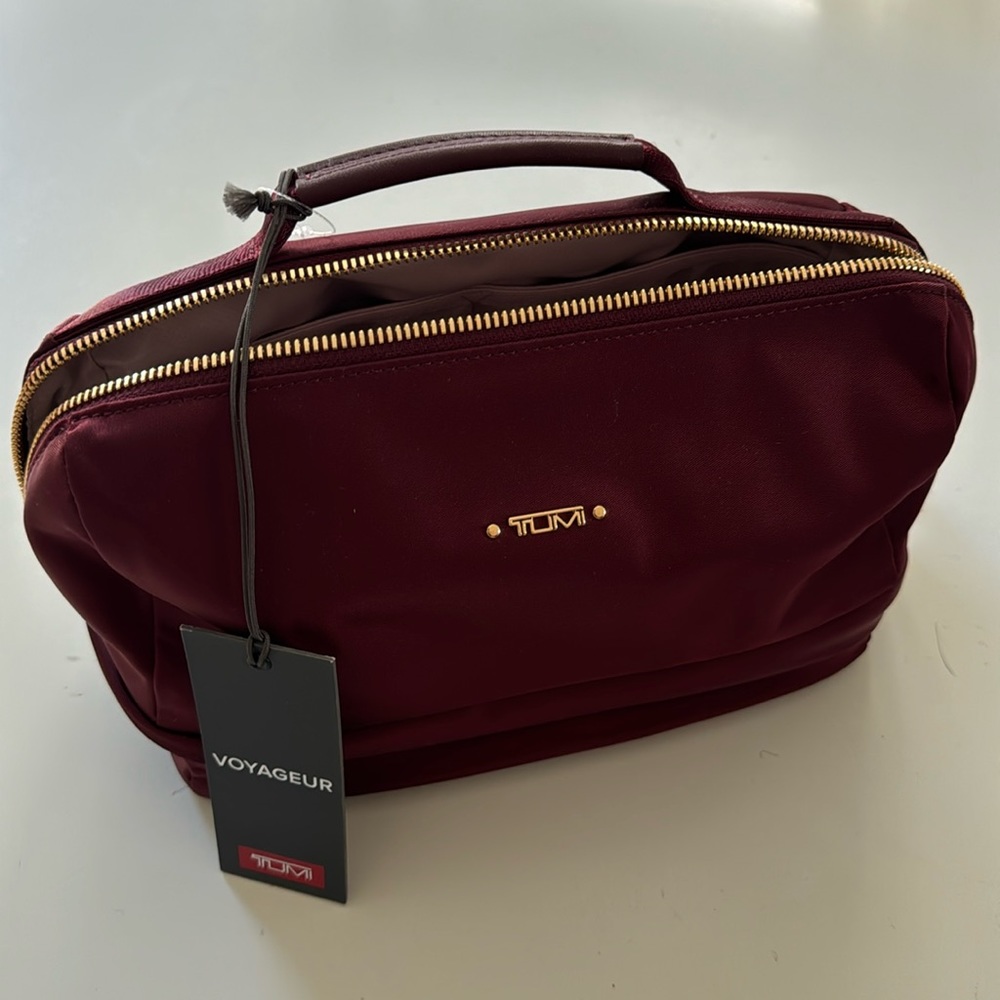 Tumi Selma cosmetic bag.  Burgundy NWT